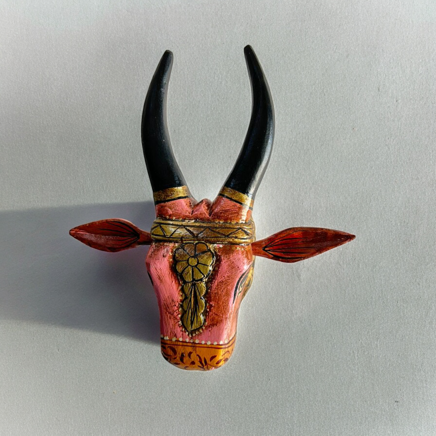 Wooden hand carved nandi head